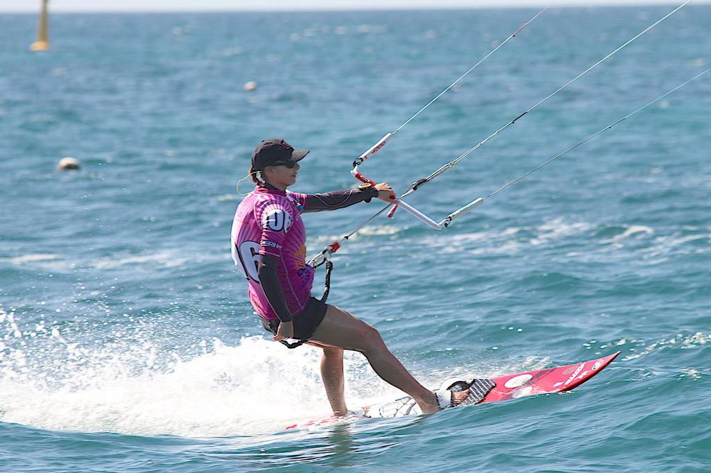 A relaxed Marie Desandre Navarre crosses the finish line - the first female competitor. © Bernie Kaaks